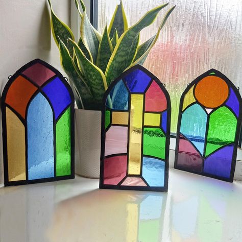 Mini church window replicas, these suncatchers are made from real cathedral glass and are crafted using traditional stained glass techniques making them the same as real church windows, just smaller. The suncatchers measure 21cm (8.2 inch) tall and 11.5cm (4.5 inch) wide. Custom orders are always welcome so if you would like different colours or a different size feel free to send me a message With extensive experience in shipping stained glass internationally, I take great care in packaging each Plate Display Stands, Stained Glass Cross, L'art Du Vitrail, Church Window, Window Stained, Stained Glass Church, Glass Suncatchers, Window Suncatchers, Church Windows