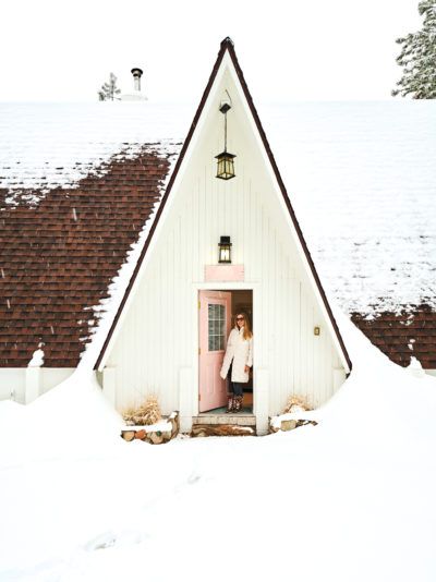 A-frames: Stories, Guides, Videos & More - Sunset Magazine A Frame Village, A Frame Exterior Colors, Cabin Front Door, Pink Cabin, Cute Cabin, A-frame Interior, Pink Front Door, Cute Cabins, Frame Cabin