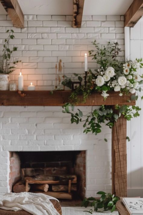 Ready to warm up your home? Check out these 10 delightful farmhouse fireplace mantel decorating ideas. From rustic accents to charming seasonal touches, these will bring that homemade warmth right into your living space. Turn your traditional mantel into a cozy focal point with natural materials like reclaimed wood, and fresh greenery. Whether you're going for a minimalist look or some festive cheer, you'll find decor inspiration that suits every style. Let your creativity shine and make your fireplace the heart of your home! White Stone Fireplace Decor, Wrap Around Mantel, How To Decorate A Mantle, Farmhouse Fireplace Decor Ideas, Hearth Decorations, Traditional Mantel, Fireplace Mantel Decorating Ideas, Farmhouse Fireplace Mantel, Stone Fireplace Decor