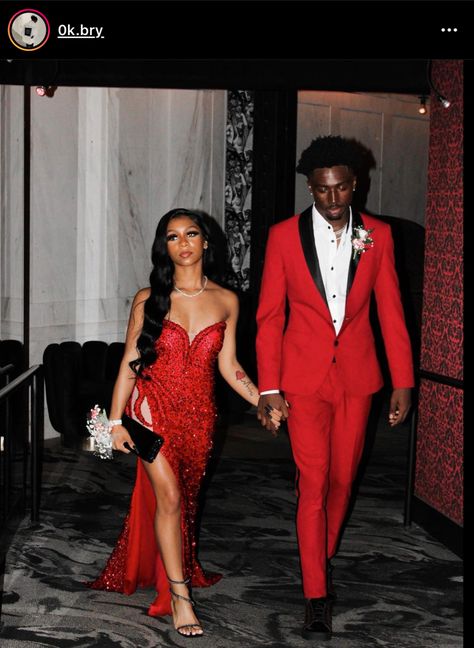 Red And Black Prom Tuxedo, Red And Black Prom Outfit Men, Silver And Red Prom Couple, Red And White Prom Suit, Red Prom Looks For Guys, Couple Prom Outfits Ideas, Red Prom Suits For Black Men, Red Prom Pictures, Red Prom Dress Black Couple