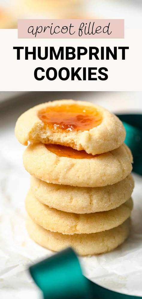 These apricot thumbprint cookies are so simple and tasty. They're made with a shortbread-like dough filled with tart apricot preserves or jam that balances the sweetness beautifully. They're perfect for any Christmas cookie box! Apricot Thumbprint Cookies Recipe, Apricot Filling Recipe, Apricot Preserves Recipe, Apricot Dessert, Apricot Bars, Apricot Preserves, Milk Chocolate Chip Cookies, Christmas Cookie Box, Chocolate Chip Pecan Cookies