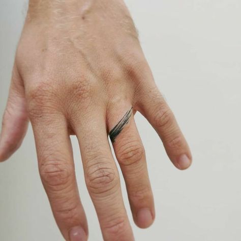 Minimalist Wedding Band Tattoo, Faded Finger Tattoos For Women, Male Ring Tattoo Wedding Bands, Unique Ring Finger Tattoo, Elegant Ring Tattoo, Unique Ring Tattoos, Mens Tattoo Ring Wedding Bands, Man Ring Tattoo, Ring Tattoo Designs For Man