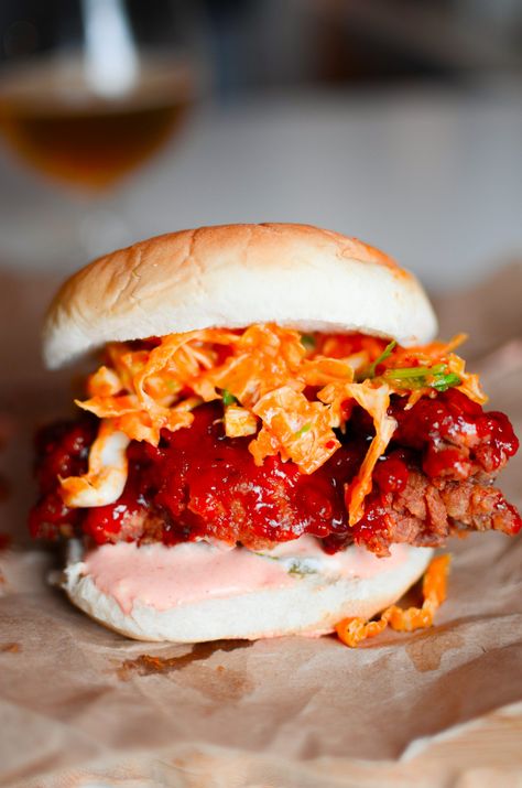 Korean Fried Chicken Sandwiches - Gochujang honey glazed fried chicken with a kimchi slaw! Korean Fried Chicken Burger, Gochujang Chicken Sandwich, Gochujang Fried Chicken, Honey Glazed Fried Chicken, Korean Chicken Sandwich, Kimchi Sandwich, Glazed Fried Chicken, Fried Sandwiches, Korean Burger