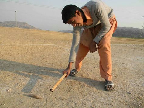 Childhood game (gilli danda) Indian Childhood, Childhood Games, Boys Playing, Google Photos, Photo And Video