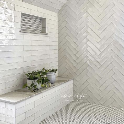 Herringbone subway tile with penny tile floor and quartz ledge. Brass hardware. Interior Delights. Master Shower White Subway Tile, Textured Shower Tile, Herringbone Shower Tile, Herringbone Tile Bathroom, Master Shower Tile, Herringbone Subway Tile, Master Bath Tile, White Tile Shower, Spec House