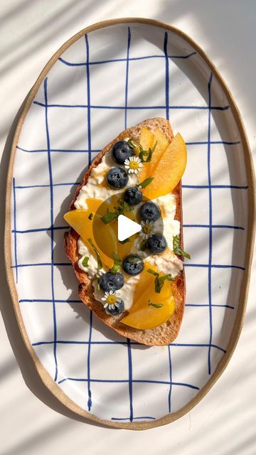 Marissa Mullen on Instagram: "SIMPLE FANCY TOASTS, Part 1 🫐 If there’s one defining thing about me, it’s that I eat toast for breakfast almost every day. I love the combination of burrata with fruit and this toast is the perfect snack for summertime. 

WHAT YOU’LL NEED:
- Burrata 
- White Plums (other stonefruit works too, like peaches, apricots, nectarines)
- Blueberries 
- Basil
- Honey
- Flakey Salt 

#ThatCheesePlate #SimpleFancyToasts" Burrata Sourdough Toast, Peach And Burrata Toast, Peach And Ricotta Toast, Lemon Berry Ricotta Toast, Peach Blueberry Goat Cheese Salad, Fancy Toast, Toast For Breakfast, Flakey Salt, Thing About Me