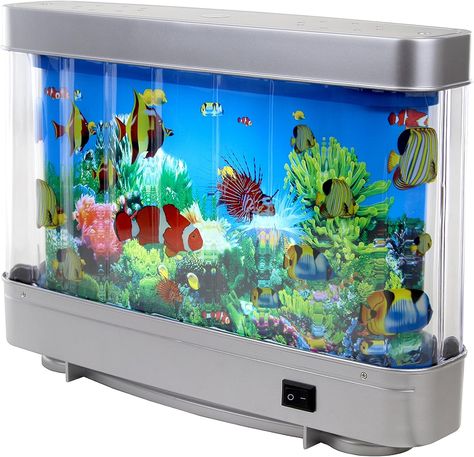 A moving picture creates the illusion of water and tropical fish in motion. Multi Colored Artificial Fish. A virtual Ocean in Motion Tropical Fish Tank, Fish Tank Themes, Aquarium Lamp, Tropical Fish Aquarium, Tropical Fish Tanks, Fish Lamp, Fish Tank Lights, Ocean At Night, Aquarium Landscape