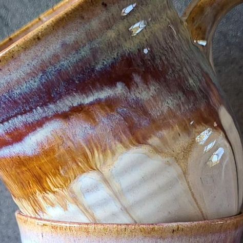 Kelsey Schroeder on Instagram: "One of my current favorite glaze combinations 🔥 this is @amacobrent honey Flux as a base with bands of deep firebrick, deep sienna speckle, and Albany slip brown (from top to bottom). Love that subtle icy blue that comes out over the firey tones below . . . . #howiamaco #honeyflux #fireandice #pottery #ceramicartist #glazedpottery #glazecombinations" Textured Amber Brown Glaze Combinations, Orange Glaze Combinations, Deep Sienna Speckle Glaze Combinations, Soda Fired Ceramics, Firebrick Glaze Combinations, Albany Slip Brown Glaze Combinations, Flux Glaze Combinations, Honey Flux Glaze Combinations, Albany Slip Brown