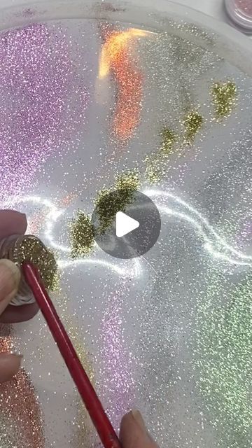 SharableArt by Shara Johnson on Instagram: "Painting with Glitter Dust! 😍

I wanted to give this resin tray a colorful marble look. I love the softness  with sparkle, calm but luxurious! 💕

@lrisystore for my gorgeous chunky  glitter 
15% off with code Sharableart 

@letsresin for my crystal clean resin 

@temu for molds and dust glitter

#makeitsparkle #addglitter #marble #resinartist #shinebright #artist #epoxy #glitterart #siliconemolds #tutorial #glitter #homedecor #elegance  #instaart #resincreations #abstract #painting #giftofgiving #inspiration #resintray #glitterpaint #resincoaster #fluidartwork #watchmework #epoxyresin #dreambig #sharajohnson #sharableart" Glitter In Resin, Painting With Glitter, Resin Plaque, Colorful Marble, How To Clean Crystals, Instagram Painting, Resin Tray, Marble Painting, Glitter Dust