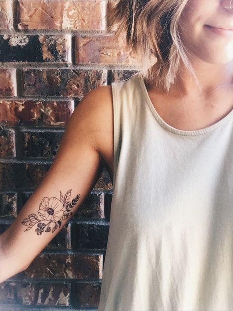 Woman’s Back Of Arm Tattoo, Flower Tattoo On Bicep Women, Flower Tattoo Bicep Women, Bicep Tattoo Women Flower, Wildflower Tattoo Inner Bicep, Floral Tattoo Arm Placement, Inner Tattoos Bicep Woman, Large Wildflower Tattoo, Wildflower Bicep Tattoo