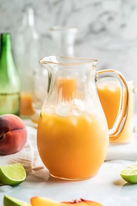 Big Batch Peach Margaritas - BeCentsational Hot Honey Peach Margarita, Batch Margarita Recipe, Large Batch Margarita Recipe, Peach Margarita Recipe, Margarita Pitcher Recipe, Big Batch Cocktails, Peach Margarita Recipes, Peach Margaritas, Pitcher Margarita Recipe