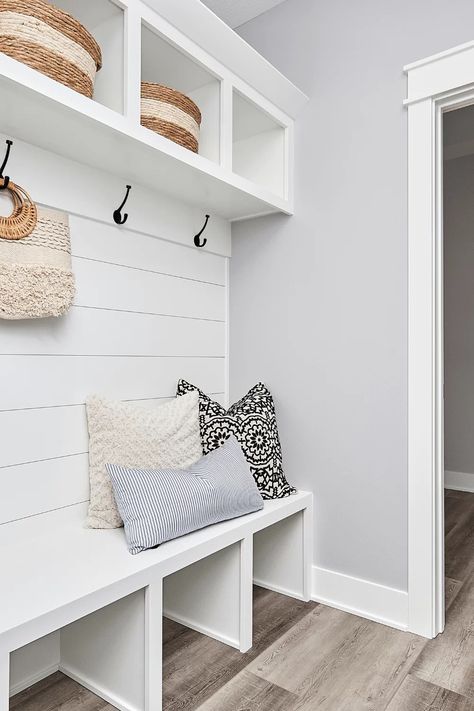 Your mudroom doesn't have to be boring! Check out these 30 mudroom designs that will give you all the inspiration you need. Mudroom Bench With Shiplap Wall, Mudroom Bench Height, Small Mudroom Ideas Entryway Entrance, Built In Bench Entryway, Shoe Storage Laundry Room, Mudd Room Ideas, Narrow Mudroom Ideas Entryway, Shiplap Mudroom, Tiny Mudroom