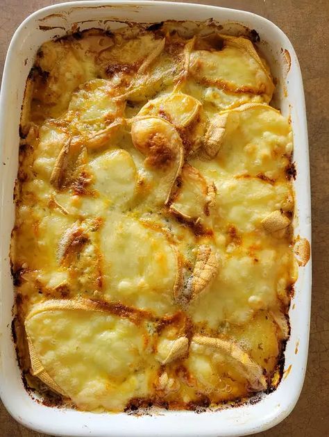 Tartiflette (French Potato, Bacon, and Cheese Casserole) | Allrecipes French Potato Casserole, Tossed Green Salad, Tartiflette Recipe, French Potatoes, Potato Bacon, Bacon And Cheese, Potato Onion, Cheese Casserole, English Food