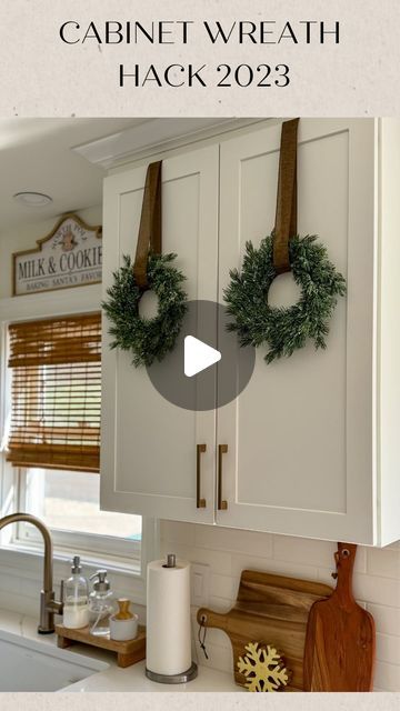 Christmas Wreath In Kitchen, Little Wreaths On Cabinets, Door Hooks For Wreaths, Kitchen Cabinet Door Wreaths, Christmas Wreath For Kitchen Cabinets, Wreaths Hanging From Windows, Cupboard Christmas Decorations, Cabinet Door Christmas Decorations, Christmas Cabinet Door Decor