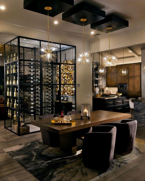 :: THE NEWCASTLE :: Just off the kitchen, the wine room with a backlit blue-agate accent wall leads you into the home's bonus room, complete with a beverage refrigerator, humidor, and access to a private courtyard. https://bit.ly/3bvt8eb Wine Fridge Wall Dining Room, Wine Room Dining Room, Wine Room In Dining Room, Coastal Wine Room, Walk In Wine Cellar, Dining Room With Wine Wall, Wine Rooms In House Modern, Walk In Wine Room, Wine Room Glass Wall