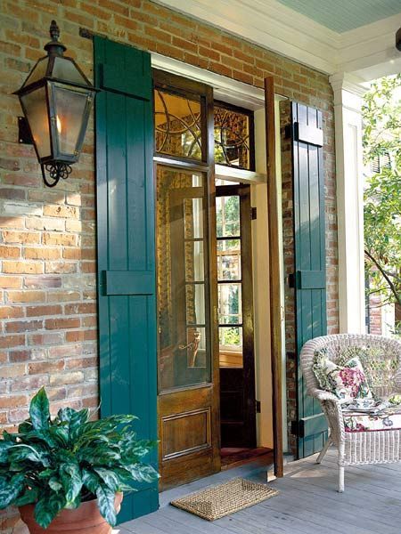 Love the New Orleans inspired exterior shutters that run the full length of the doors.: Industrial Front Doors, French Door Shutters, Outdoor Shutters, Diy Shutters, Casas Coloniales, Shutters Exterior, Shutter Doors, Window Shutters, Glass Doors