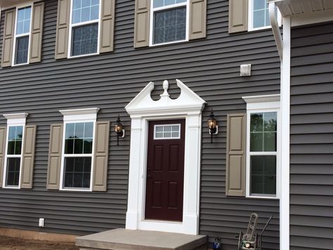 "Twilight Shadow" siding, "Pebble Clay" shutters, "Marooned" door - Ryan Homes Palermo. Twilight Shadow Vinyl Siding, Craftsman Front Doors, Siding Trim, Garage Exterior, Ryan Homes, Siding Colors, Front Steps, Exterior Remodel, House Siding