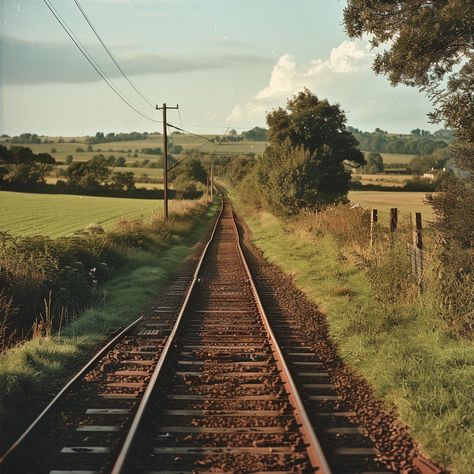 Endless Railroad Tracks: Railroad tracks stretching into the distance amidst a tranquil rural landscape under a clear sky. #railroad #tracks #countryside #serene #landscape #aiart #aiphoto #stockcake ⬇️ Download and 📝 Prompt 👉 https://ayr.app/l/zMBC Chris And Gordie, Railway Aesthetic, Railroad Crossing Signs, Guitar Drawing, Into The Forest I Go, Pathway Landscaping, Dancing Animals, Scenic Railroads, Railroad Pictures