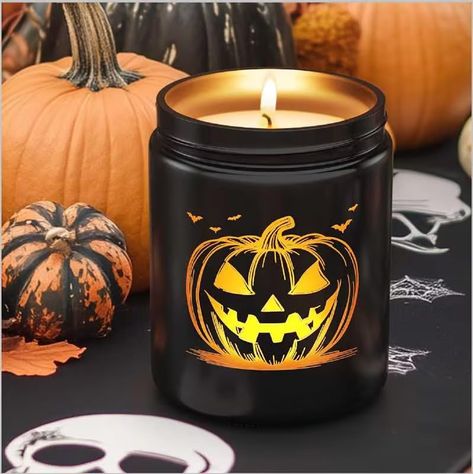 PRICES MAY VARY. 🎃 GLOW-UP PUMPKIN FACE - When this Halloween candle is ignited, the intricately carved pumpkin face comes to life, casting a mesmerizing and eerie glow that transforms any space into a spooky Halloween haven ✨ EYE-CATCHING HALLOWEEN DECOR - This black glass pumpkin candle with a glowing pumpkin face adds a spooky yet stylish touch to any Halloween decor, perfect for enhancing your home, office, or party décor 👍 FALL SCENT PROFILE - Top notes of pumpkin and ground ginger, mid n Pumpkin Spice Scent, Pumpkin Candle, Halloween Candle, Fall Candle, Pumpkin Face, Halloween Decorations Indoor, Decor Fall, Halloween Decor, Over 40