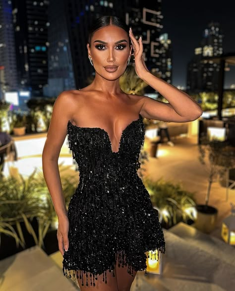 To place your order, simply send us a DM @reineecouture! Immerse yourself in the epitome of chic sophistication with our captivating strapless black dress, a flawless fusion of timeless glamour and contemporary flair. This short yet striking gown is meticulously crafted to captivate and enchant, boasting a design that effortlessly exudes elegance and allure. At the core of this captivating ensemble lies its impeccable craftsmanship and meticulous attention to detail. The strapless bodice, ad... Cocktail Chic Outfit, Stunning Dresses Short, Black Prom Dress Short, Strapless Black Dress, Short Bridal Dress, Short Black Dress, Custom Made Dresses, Haute Couture Details, Timeless Wedding Dress