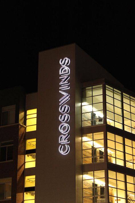 Hotel Signage Design Outdoor, Building Signage Exterior Facades, Backlit Signage Outdoor, City Signage Design, Vertical Signage, Tower Signage Design, Blade Signage, Backlit Signage, Building Front Designs