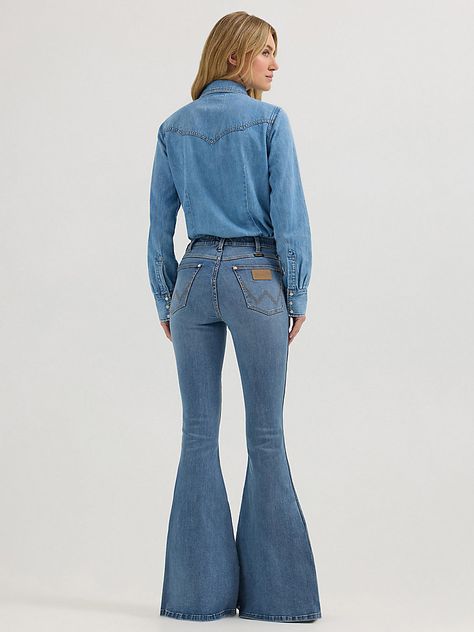 DREAMS DON’T CHASE THEMSELVESWhile Lainey loves bell bottoms, she adores these. Featuring super stretchy and comfortable bespoke fabric, The Wrangler® x Lainey Wilson Daydream Flare Bell Bottoms is a denim dream come true. A true Lainey favorite. Their modern feminine fit is modeled after our high-rise Retro Trumpet Flare only we gave them a slimmer knee and fuller bell bottom to honor Lainey’s go-to silhouette. They’ve got a light wash with a finished hem, as well as iconic details including the 'W' stitching on the back pocket, Wrangler patch, and riser label. Lainey’s full signature is embroidered on the waistband as a nod to how hands-on she was in the creation of every collection piece, including this one. Plus, her "LW" initials are embroidered onto the coin pocket, and there’s a pri Wrangler Flare Jeans, Men Workwear, Lainey Wilson, Twisted X Boots, Toddler Boots, Modern Feminine, Bottom Jeans, Long Sleeve Kids, Boys Bottoms