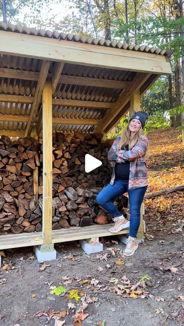 Carrie Anne | Furniture Flips & Home DIY Tips on Instagram: "We were tired of looking at our ugly wood pile, so we finally did something about it 🙌🏼 We grabbed some plans online, ordered a supplies delivery, and managed to bang it out in one weekend. Now we have this pretty storage shelter tucked into the trees, and so much more room for activities 🤗

Drop any questions you have below👇🏻" Lean To Wood Shed Firewood Storage, Outdoor Fireplace Wood Storage, Wood Shed Ideas Firewood, Diy Firewood Storage Outdoor, Wood Shed Ideas, Mountain Backyard, Wood Storage Ideas, Shelters In The Woods, Firewood Storage Outdoor