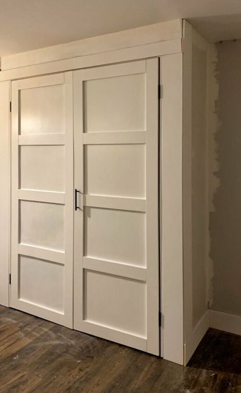 If you drool over beautiful new shaker style doors in the hardware store like I do but you gag at the price tag then this DIY door is for you!DIY Shaker Style Doors Diy Shaker Closet Doors, Craftsman Bifold Closet Doors, Shaker Style Closet Doors, Farmhouse Closet Doors, Closet Doors Ideas, Homemade Door, Diy Shaker Door, Bifold Doors Makeover, Diy Doors