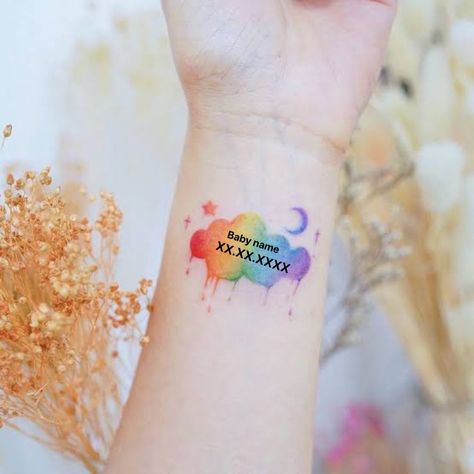 Rainbow Name Tattoo, Infinity Rainbow Tattoo, Cloud With Rainbow Tattoo, Rainbow Baby Tattoo Ideas, Rainbow Butterfly Tattoo Ideas, Rainbow Baby Tattoo, Butterfly And Rainbow Tattoo, Rainbow Baby Names, Baby Tattoo