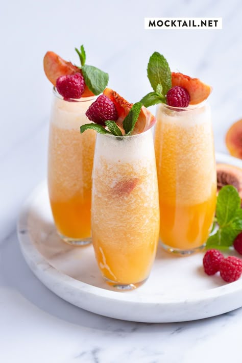 The BEST Easy Non-Alcoholic Bellini Mocktail Recipe – Creative Drinks and Family Friendly, Alcohol-Free, Big Batch Party Beverages for a Crowd! Bellini Recipe Easy, Peach Bellini Mocktail, Bellini Mocktail, Peach Bellini Recipe, Popular Alcoholic Drinks, Mocktail Drinks, Bellini Recipe, Alcohol Free Drinks, Drink Recipes Nonalcoholic