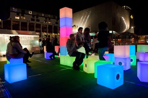 Pixels is an interactive installation designed as a playful set of blocks that allow to create dynamic environments controlled by the public rather than the artist. The installation is composed out of multiple LED-lit cubes, which can change the color and intensity by rotation. Pop Up Gallery, Amsterdam Light Festival, Gazebo Decor, Cube Seat, Vivid Sydney, Cube Chair, Pop Up Ideas, Apps Social Media, Rainbow House