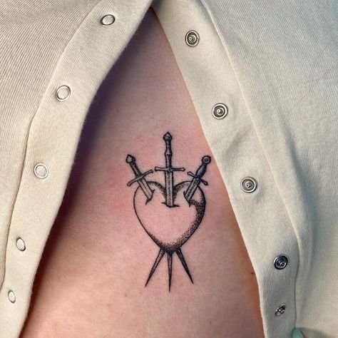 333 Tattoo On Finger, Pierced Through The Heart Tattoo, Heart With 3 Swords Tattoo, Heart Swords Tattoo, Two Of Swords Tattoo, Heart With Three Swords Tattoo, 3 Of Hearts Tattoo, Guarded Heart Tattoo, Pierced Heart Tattoo