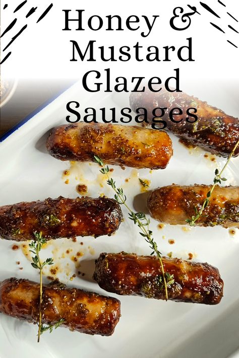 Honey, mustard, & pork are combined so often that it could be considered a holy trinity. These honey & mustard glazed sausages prove it. There’s no reason you couldn’t substitute the pork sausages for a beef, chicken sausage, or any other sausage you like, even a veggie sausage. However, pork’s fat content makes it the ideal meat for a sausage, which the other alternatives fail to replicate. Honey Glazed Sausages, Honey And Mustard Sausages, Honey Mustard Cocktail Sausages, Honey Mustard Sausages, Glazed Sausages, Farmer Sausage, Bacon Wrapped Sausages, Cumberland Sausage, White Sausage