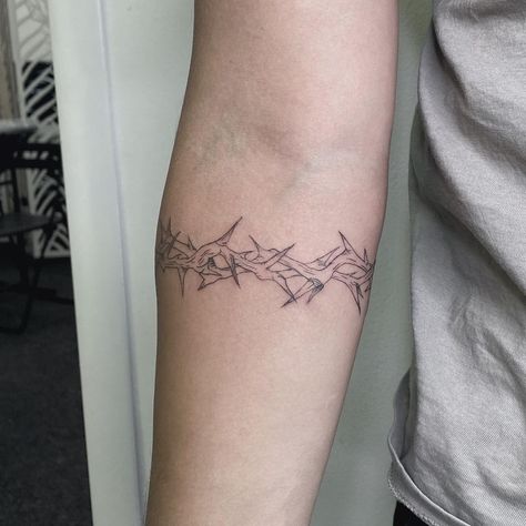 Forearm Barbed Wire Tattoo, Border Tattoo Ideas For Men, Thorn Forearm Tattoo, Thorn Tattoo Around Arm, Forearm Thorn Tattoo, Thorns Tattoo Arm, Thorn Wrist Tattoo, Barbwire Tattoo Arm, Thorn Band Tattoo