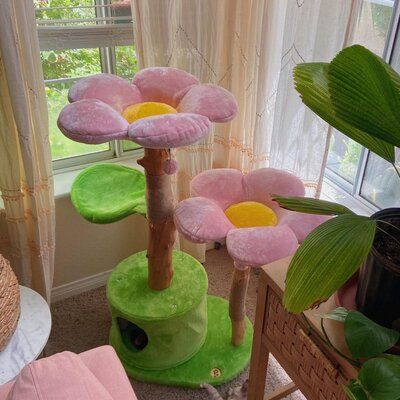 Want a unique cat tree that beautifies your home while giving your cat a place to rest? This stunning, lifelike Cherry Blossom Cat Tree is the one you are looking for. Inspired by the natural beauty of the Cherry Blossom Tree, this modern floral design is hand-made with real natural, treated wood branches, two cozy cherry blossom-designed flower cat beds, and one leaf design perch. It has an enclosed, private condo on the ground floor and two dangly pom-pom toys attached for playtime fun. ***All Flower Cat Tree, Katt Grejer, Cat Tree House, Modern Floral Design, Flower Cat, Wood Branch, Cat Beds, Floral Cat, Cat Condo