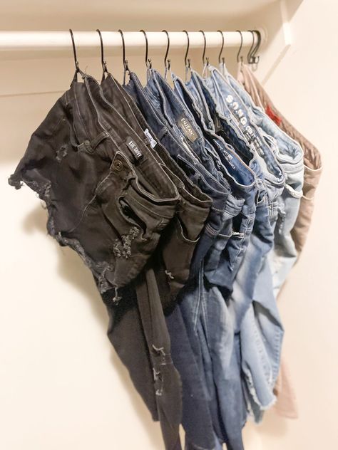 The Best Closet Hack for Hanging Your Jeans, Pants & Even Shorts - winey women Closet With Hooks Only, Hanging Pants On Shower Hooks, Hooks For Jeans In Closet, Hanging Jeans With Shower Hooks, Hang Jeans On Shower Curtain Hooks, Shower Hooks For Jeans, How To Hang Shorts On A Hanger, S Hooks For Jeans, Hanging Shorts In Closet