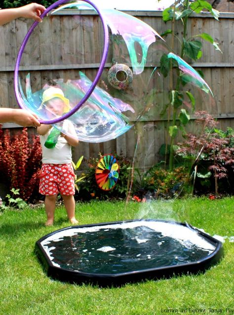 Giant Bubbles Recipe Make your own Giant Bubbles Stem Chemistry, Kids Messy Play, Giant Bubble Recipe, Bubbles Recipe, Messy Play Activities, Summer Activities For Toddlers, Community Farm, Work Planning, Bubble Recipe