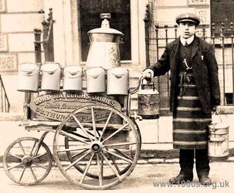 Milk delivery boy with handcart, jugs and churns, early 20th century Milk Delivery, Milk Man, Victorian Life, Victorian London, London History, Old London, Vintage London, British History, Bw Photo