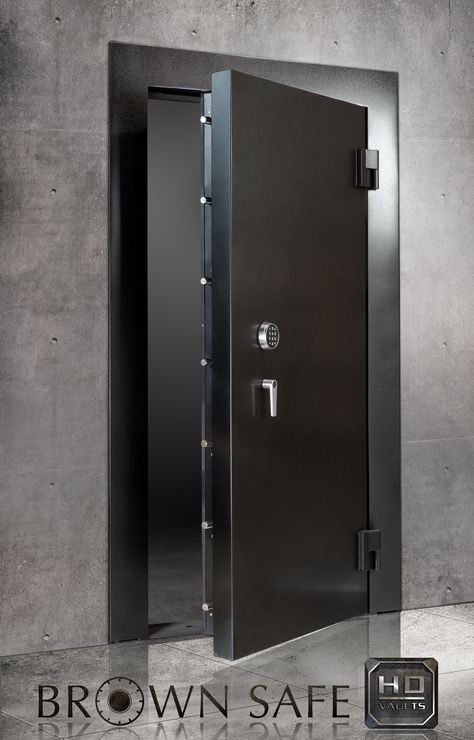 The Brown Safe Vault Doors is a premium protection high security door offering the finest in form and function. These vault doors are large and heavily secured safe doors that provide the preferred method of fortification for custom built vaults that are large enough to allow walk in access. Best vault door for safe room doors. Walk In Safe, Harvard Essay, Conclusion Essay, Safe Room Doors, Apartment Security, Security Room, Safe Door, Panic Rooms, Vault Doors