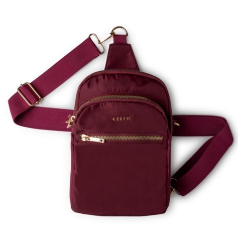 This Roundtrip Convertible Sling Bag From Kedzie Has Perfectly Placed Hardware To Convert This Mid-Size Sling Into A Classic Crossbody. Brand New With Tags, Burgundy Removable, Adjustable Strap - 55" Fully Extended Large & Mid-Size Compartments Front Zippered Pocket Back Slip Pocket Snag Resistant Resin Zipper Print Lining Lightweight Easy-To-Clean Polyester 9" H X 7" W X 2.5" D *Compatible With Mix & Match Bag Straps - Available On Website. Sleek Back, First Class Tickets, Mini Convertible, Cell Phone Purse, Saint John, Phone Purse, Judy Blue Jeans, Mid Size, Metallic Logo