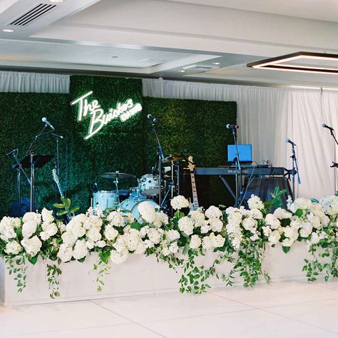 If you and your partner have decided that having a live band at your wedding is the best fit, you’re in for a real treat. Incorporating live music can immediately change the mood of your reception, bringing a new and exciting energy to the mix. But now that you’ve secured your musical performance for the big day and you've gone over the playlist, w... Tall Floral Arrangements, Wedding Reception Backdrop, Beachside Wedding, Dance Floor Wedding, All White Wedding, Floral Event Design, Stage Set, Stage Decorations, Wedding Stage