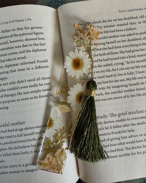 Made this beautiful floral bookmark with green tassel. Loved how it turned out giving full green breezy feels, sure to be a bookworm’s favourite accessory! 🌿 DM to order or order directly from our website 📥 #bookmarks #floralbookmark #resinbookmark #bookmarkwithtassel #bookwormaesthetic #bookmarkcollection Resin Making, Book Worms, Tassels, Turn Ons, Feelings, Floral, Green, Quick Saves, Instagram