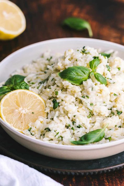 Savor the vibrant and zesty flavors of this lemon basil rice recipe. Featuring fresh basil, lemon juice, lemon zest, and fragrant jasmine rice, this delightful side dish complements nearly any meal. Quick and easy, it's ready in just under 25 minutes! Lemon Basil Rice, Basil Rice Recipe, Basil Rice, Tomato Risotto, Recipe For Summer, Garlic Rice, Side Dishes For Chicken, Gluten Free Sides, Basil Recipes