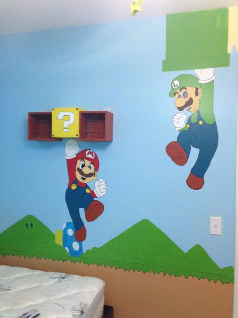 Mario themed kids room. Question mark shelf opens for a special hiding spot. Mario Art Painting, Super Mario Kids Room, Super Mario Themed Bedroom, Mario Room Ideas, Super Mario Room Decor, Super Mario Bedroom Ideas, Mario Bedroom Ideas Boys, Mario Room Ideas Boys, Mario Themed Bedroom