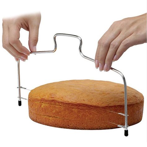 Specification:     100% brand new     This Cake Cutter is ideal for both professional & amateur bakers alike.     The lightweight cutter is used to slice a cake in to up to 3 sections, out of two available wires. The wire is adjustable so you can cut to measure.     Size: approx 34x17cm/13.6x6.8inch     Material: Stainless steel     Color: Silver Package included:     1pc x Cake Cutter Leveler Am 31.12.2022 hat der Verkäufer die folgenden Angaben hinzugefügt: Cake Slicer, Bread Slicer, Tool Cake, Clear Bowls, Cooked Breakfast, Baking Accessories, Fondant Cakes, Decorating Tools, Pizza Dough