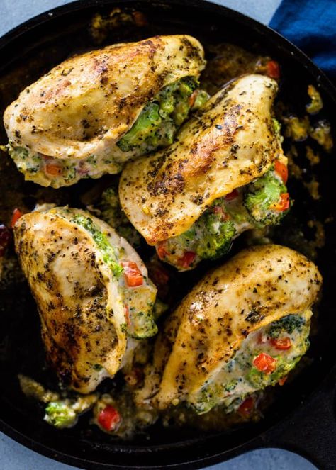 These cheesy broccoli-stuffed chicken breasts from Gimme Delicious are delicious, easy, and impressive. Simply stuff your chicken with broccoli with some chopped bell pepper, garlic, and a mixture of your favorite cheeses. The author suggests a combination of freshly grated Parmesan, some cream cheese for creaminess, and something melty, like a cheddar or mozzarella. Then just cook the chicken on the stove until it's ready and your decadent weeknight dinner is served! Broccoli Stuffed Chicken, Broccoli Stuffed Chicken Breast, Zucchini Stuffed, Chicken With Broccoli, Gimme Delicious, Cheesy Broccoli, Cheese Stuffed Chicken, Chicken And Broccoli, Parmesan Zucchini