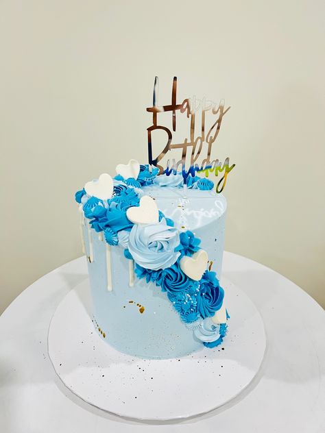 Get over the Monday Blues !!   
🌀😀 
...........
Flavor- 6" Tall Chocolate classic cake masked with Ice blue shade and decorated with two contrast Rosettes & few handmade white chocolate hearts 🤍 
🌀Silver Happy birthday topper & added gold paint splashes Ice Blue Birthday Cake, 18th Birthday Cake Blue And White, Tall Cake Decoration, White Blue And Gold Cake, Blue White Silver Cake, Blue Cake Ideas Birthday Simple, Blue And Silver Cake Ideas, Sky Blue Cake Ideas, Tall Cakes Birthday