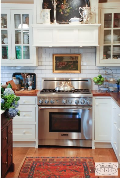 Since I never use my stove, I was able to dress up the space above the range with a painting. Stove Decor, Kitchen Design Color, Houses Ideas, Cottage Kitchens, Classic Kitchen, Antique Kitchen, Kitchen Farmhouse, Dream Houses, Kitchen Wall Decor