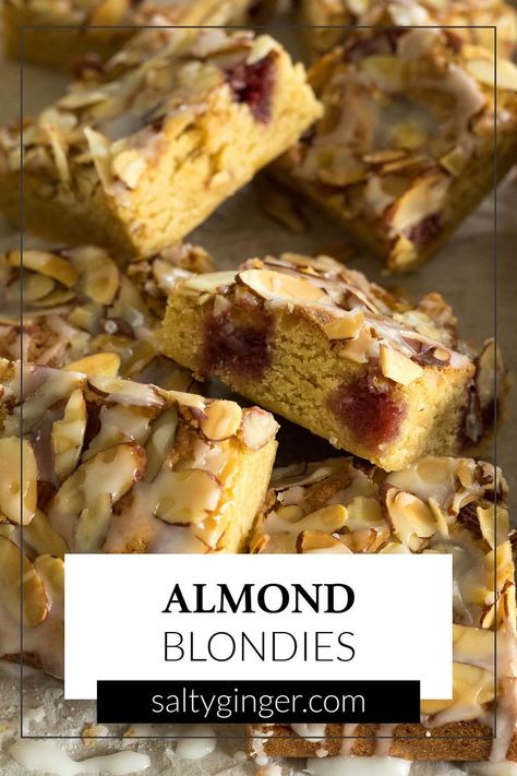 Sliced almond blondies on baking parchment. Almond Blondies, Icing Glaze, Almond Meal, Blondies Recipe, Raspberry Jam, Homemade Desserts, Almond Recipes, Dessert Recipes Easy, Easy Desserts