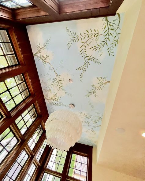 New ceiling mural @serenbe See more murals, request a commission, or buy original art on my new website: MorganBstudio.com #mural #serenbe #ceiling #branches #clouds #skymural #artist #painting #muralist #art #boszilkov #morgan #loveart #artlover #interiordesign #decor #home #design #artsy #blueandgreen #interior #inspo #inspiration Sunroom Mural, Cloud Ceiling Painting, Sky Painting On Ceiling, Floral Mural On Building, Ceiling Painted Like Sky, Whimsical Flower Wall Mural, Sunny Sky Ceiling Mural, Cloud Ceiling, Whimsical Bedroom